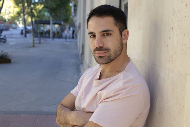 istock Good looking man headshot outdoors 1353378685