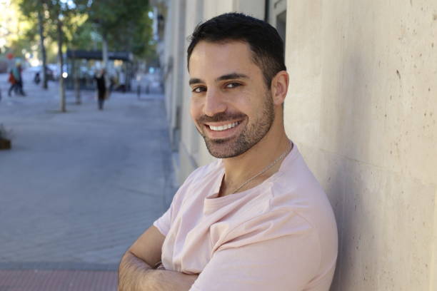 istock Good looking man headshot outdoors 1353378692