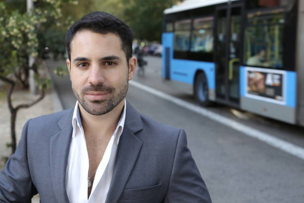 istock Handsome elegant man with urban road in the background 1353378765