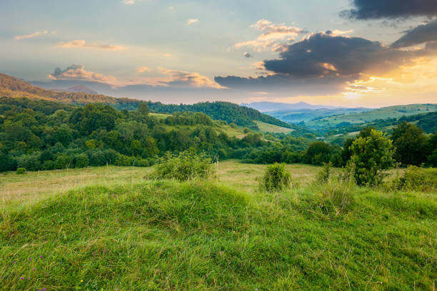 istock carpathian mountain countryside at sunrise 1353378797