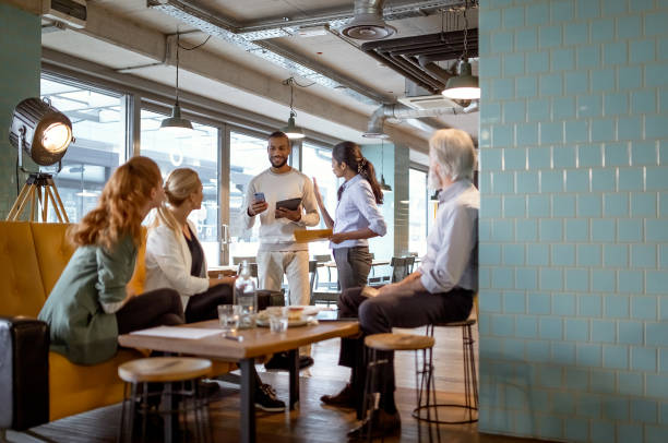 istock Business meeting in a cafeteria 1353378869