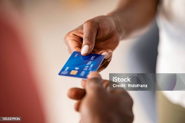 Black Woman Paying With Credit Card Stock Photo - Download Image Now - Credit Card, Giving, Hand