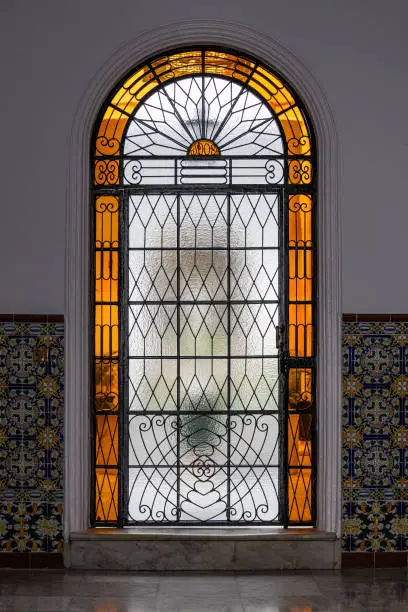 Stained glass door in a mediterranean village
