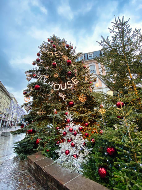 istock Illuminated christmas tree at christmas time in Mulhouse, Alsace 1353383810