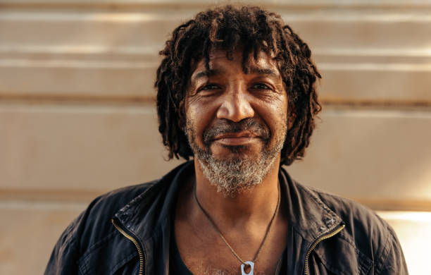 istock Cheerful homeless man looking at the camera 1353383813