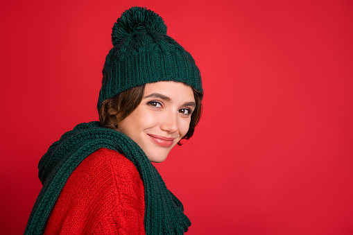 Profile side photo of young woman happy positive smile winter season isolated over red color background