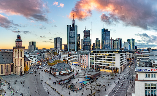 Frankfurt, Germany - November 13, 2018: view to Hauptwache, a former central guard house and the skyline of Frankfurt in Sunset.