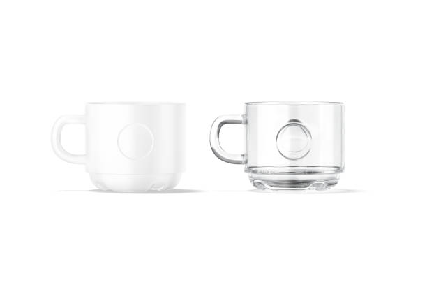 istock Blank ceramic and glass 8oz mug with label mockup stand 1353384265