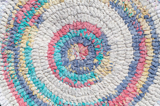 istock Handmade round knitted rug close-up 1353387910