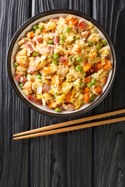 istock Authentic Yangzhou Fried Rice Chao Fan close up in the plate. Vertical top view 1353388406
