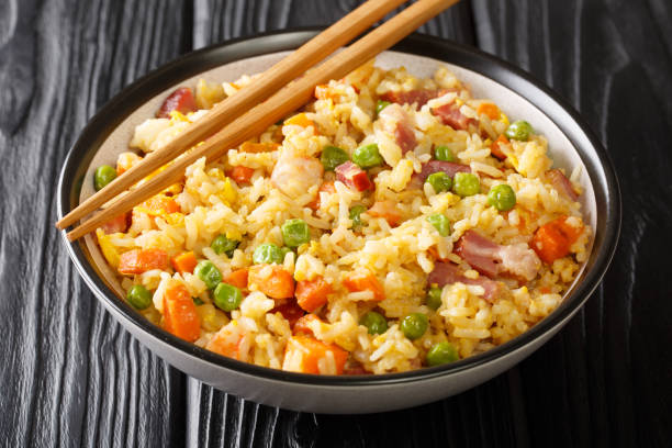 Chinese Egg Fried Rice Yang Chow Fried Rice close up in the plate. Horizontal