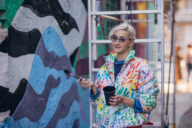istock Charming female street artist 1353389320
