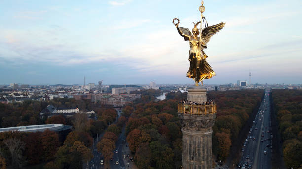 istock Statue on the Victory Column in Berlin from the sky in Autumn 1353391669