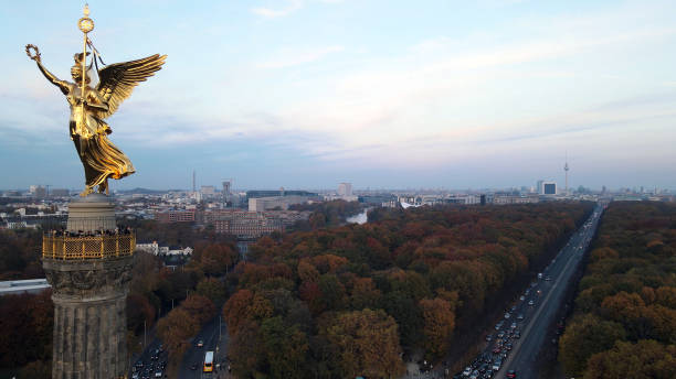 istock Statue on the Victory Column in Berlin from the sky in Autumn 1353391689