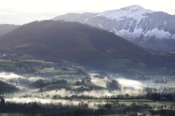 istock Sunrise and morning mists over the baretous valley - Atlantic Pyrenees 1353391712