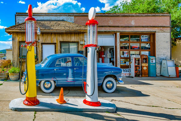 old retro filling station in Williams with collectors car stock photo