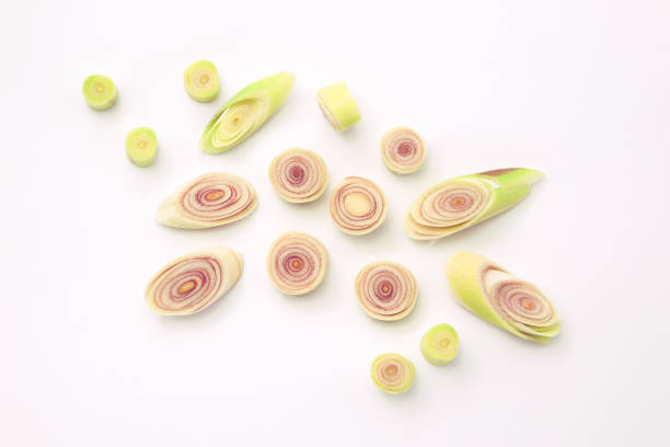 Fresh lemongrass slice on white paper background , top view , flat lay.