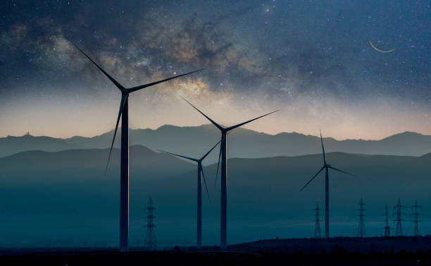 turbiny wiatrowe na pustyni atakama w nocy z tłem drogi mlecznej - industry dusk night sustainable resources zdjęcia i obrazy z banku zdjęć