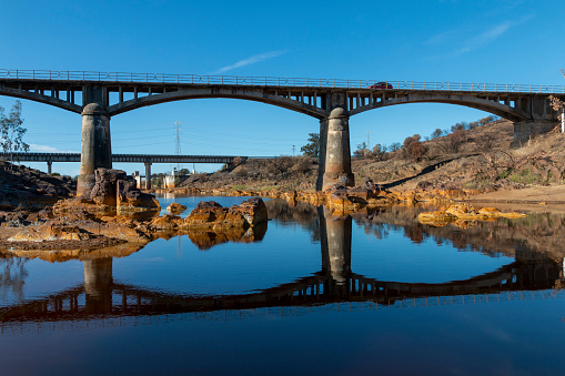 Bridge reflecting over the Rio Tinto, (Tinto River) in huelva, spain