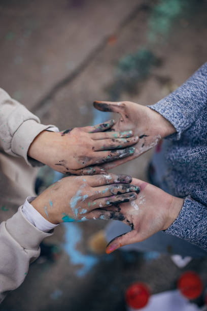 istock Dirty hands from street art 1353400919