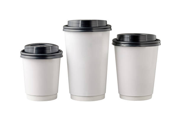 istock Three different sizes of white takeaway paper cups with black plastic lids isolated on white background. 1353401697