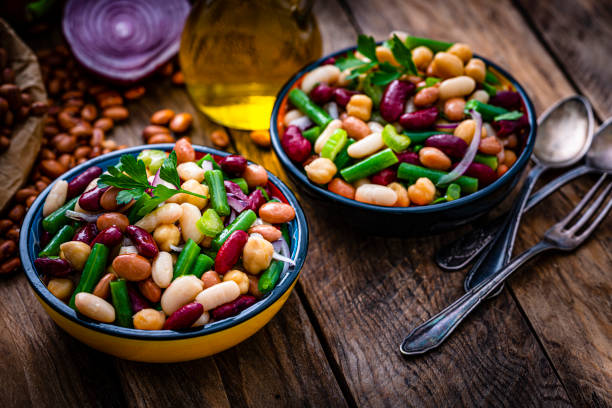 istock Two bean salad bowls with ingredients 1353402861