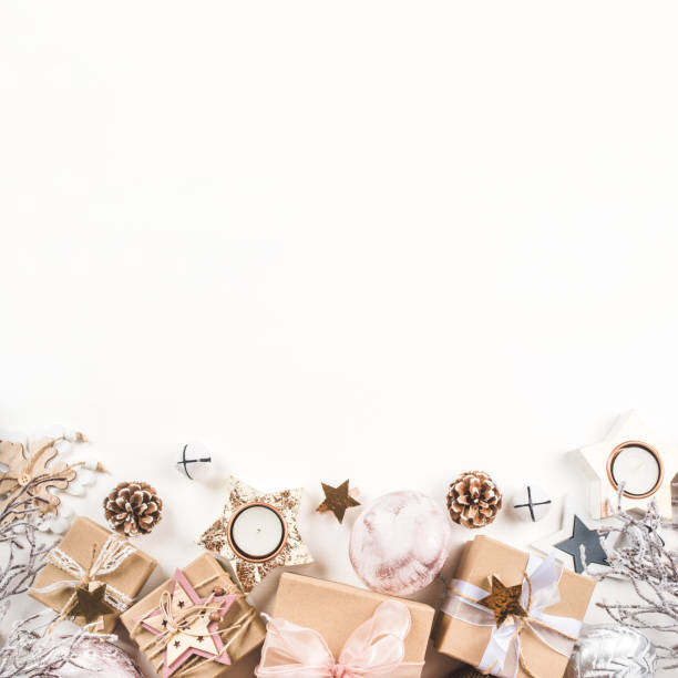 istock Festive Christmas background with gift boxes and Christmas decorations 1353403637