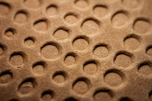 istock Extreme macro of embossed brown paper 1353408443