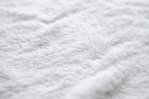 istock Background of white plush fabric. 1353408469