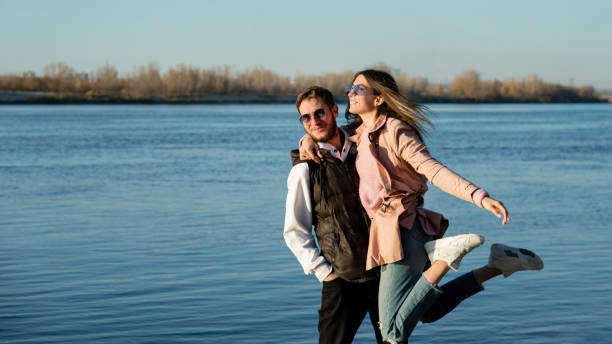 istock Loving couple sea beach 1353410233