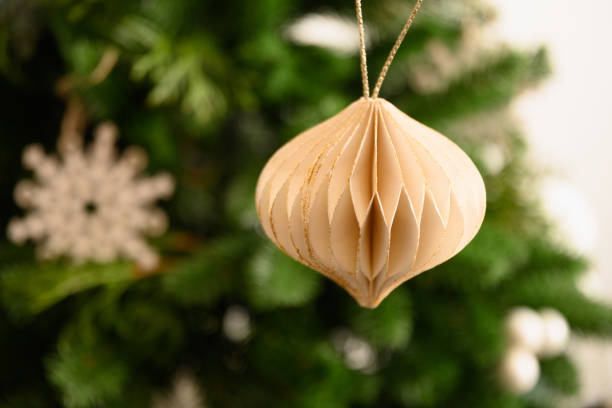 istock White paper Diy decor on Christmas tree. 1353410981
