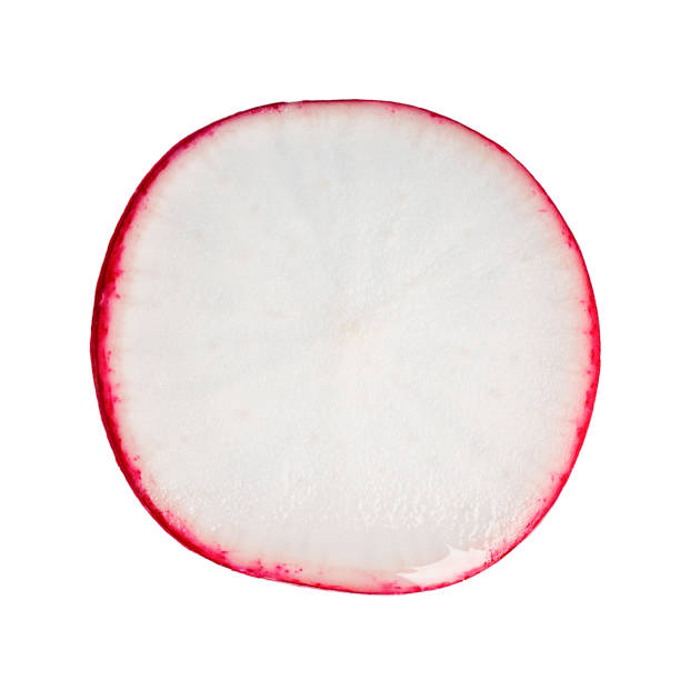 istock Slice of radish isolated on white background 1353411807