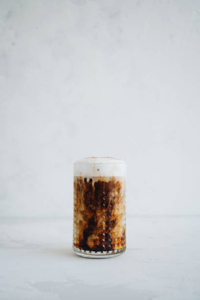 istock A glass of cappuccino coffee at white background 1353417036