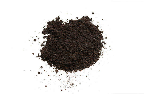 istock Black land for plant isolated on white background. 1353417125