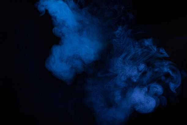 istock Blue and pink steam on a black background. 1353417237