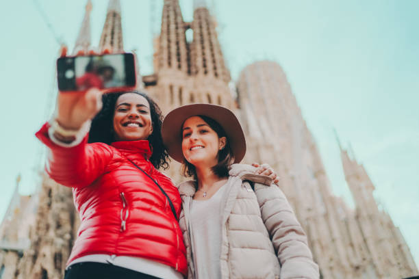 istock Girls taking selfie in Barcelona 1353417353