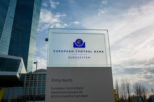 Frankfurt, Germany - November 09, 2020: European Central Bank ECB, EZB headquarters at Eastend Frankfurt, Germany. The European Central Bank (ECB) is the central bank of the Eurozone. Close-up of the logo in front of the building.