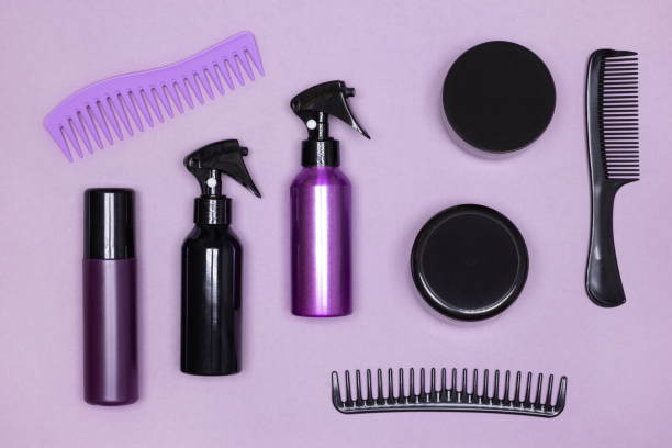 istock Different hair care and styling products with combs layout. Top view, flat lay 1353419756