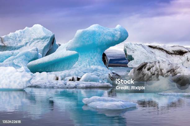 Beautiful Blue Icebergs Reflected In The Jokulsarlon Glacial Lagoon Southern Iceland Stock Photo - Download Image Now