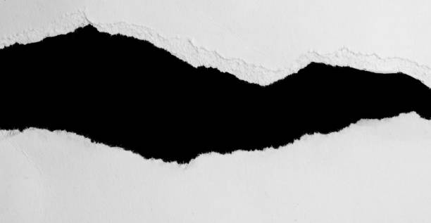 istock a white piece of paper on a black isolated background 1353429562