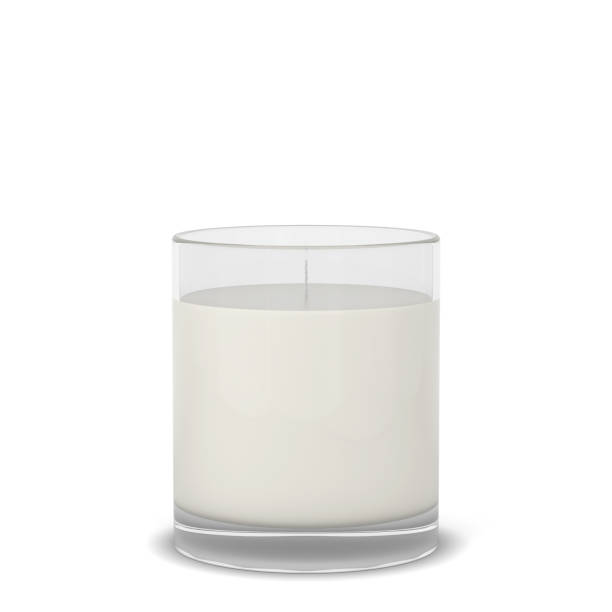 istock Wax candle in a glass 1353430333