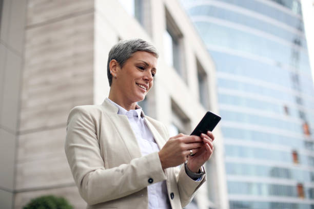 istock Businesswoman texting 1353431694