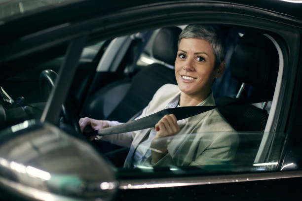 istock Woman driving a car 1353433461