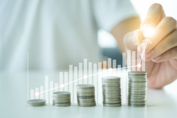 Money saving and growth concept. Concept of financial planing and saving for the future. Man saving a Money for investment in the future. Financial growth - investment concept. savings account stock pictures, royalty-free photos & images