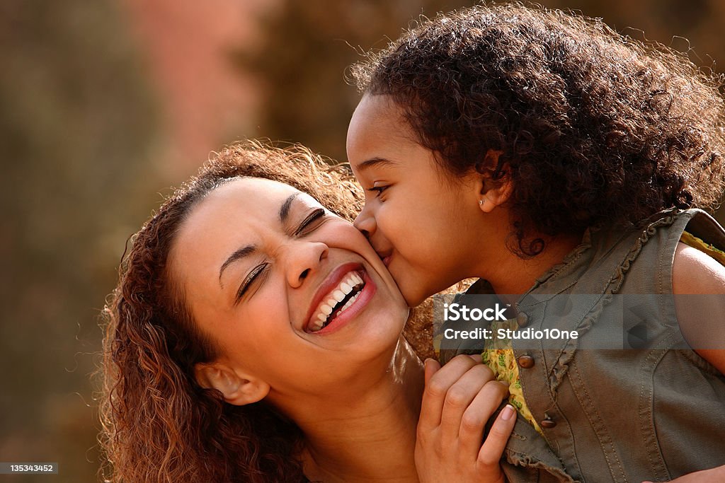 Mother & Child kiss Mother Stock Photo