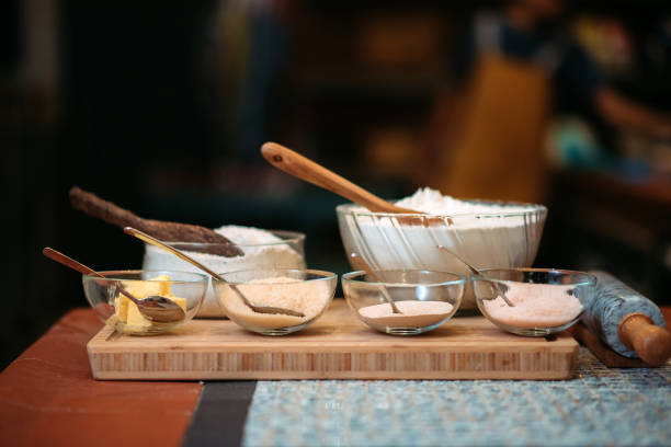 Group of baking ingredients preparing on the table top in the kitchen stock photo