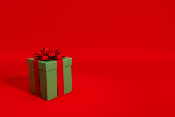 istock 3D Christmas Gift / Present on Red Background with Copy Space 1353442746