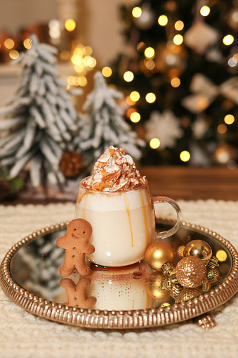 Gingerbread Latte hot chocolate for Christmas with caramel snd whipped cream