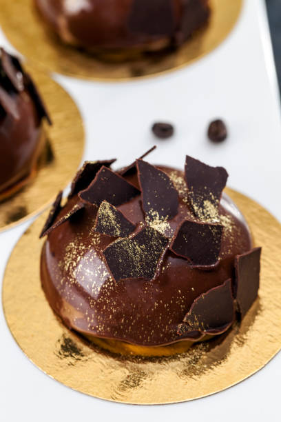 istock delicious chocolate cake covered with milk chocolate 1353443325
