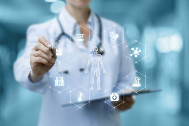 istock Doctor on the virtual screen shows the structure of the patient study. 1353445737